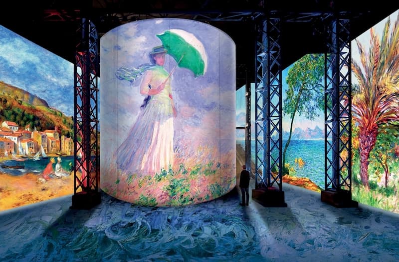 Monet painting projected on a column at Atelier des Lumieres in Paris
