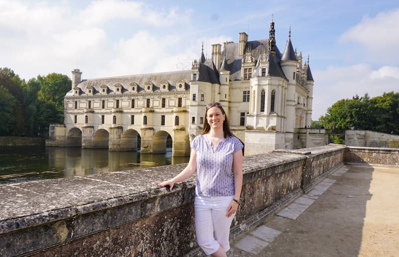 Cassie Tetro standing in front of Chateau Chenonceau