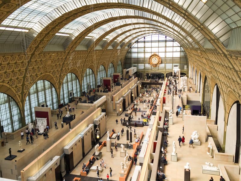 Long view interior shot of the central hallway in the Orsay Museum in Paris, France