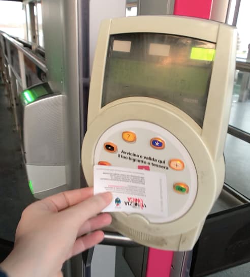 Validating a vaporetto ticket in Venice