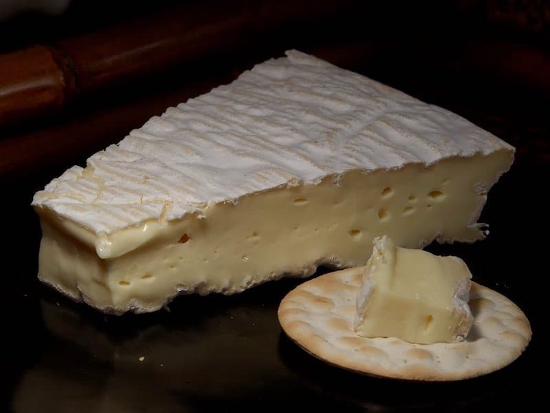 Slice of brie de meux frech cheese