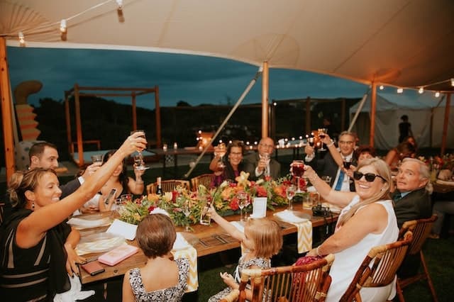 Group of friends toasting to their great tour in Europe
