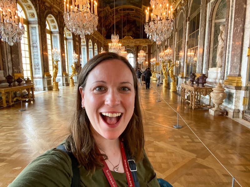 Cassie Tetro in an uncrowded Hall of Mirrors inside Versailles Palace