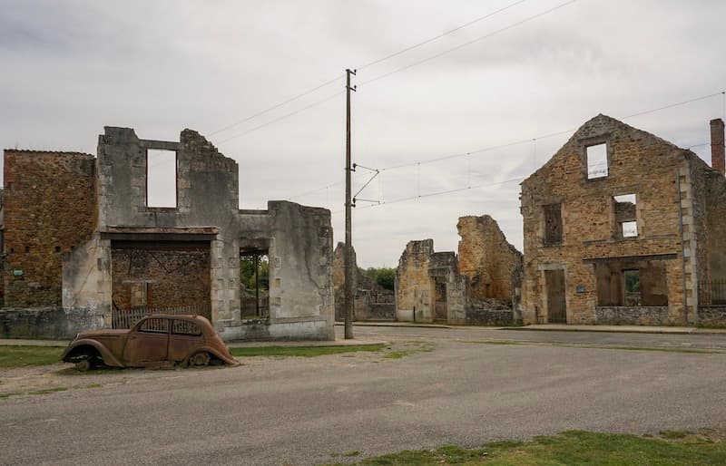 Oradour-Sur-Glane memorial village street and burned out car