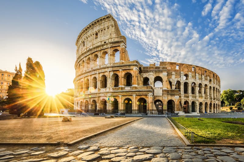 The Roman Colosseum at sunset in Rome, Italy.
